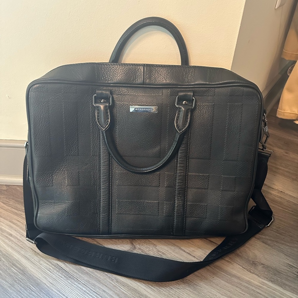 Leather Burberry briefcase. Black. Great condition. Laptop sleeve & pockets.